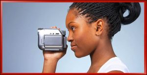 Woman Holding Camera One Hand