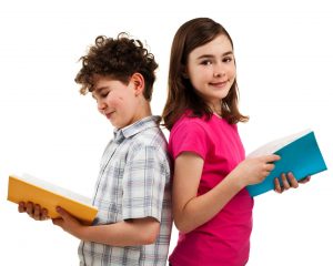 Two Children Boy and Girl Holding Books Smiling